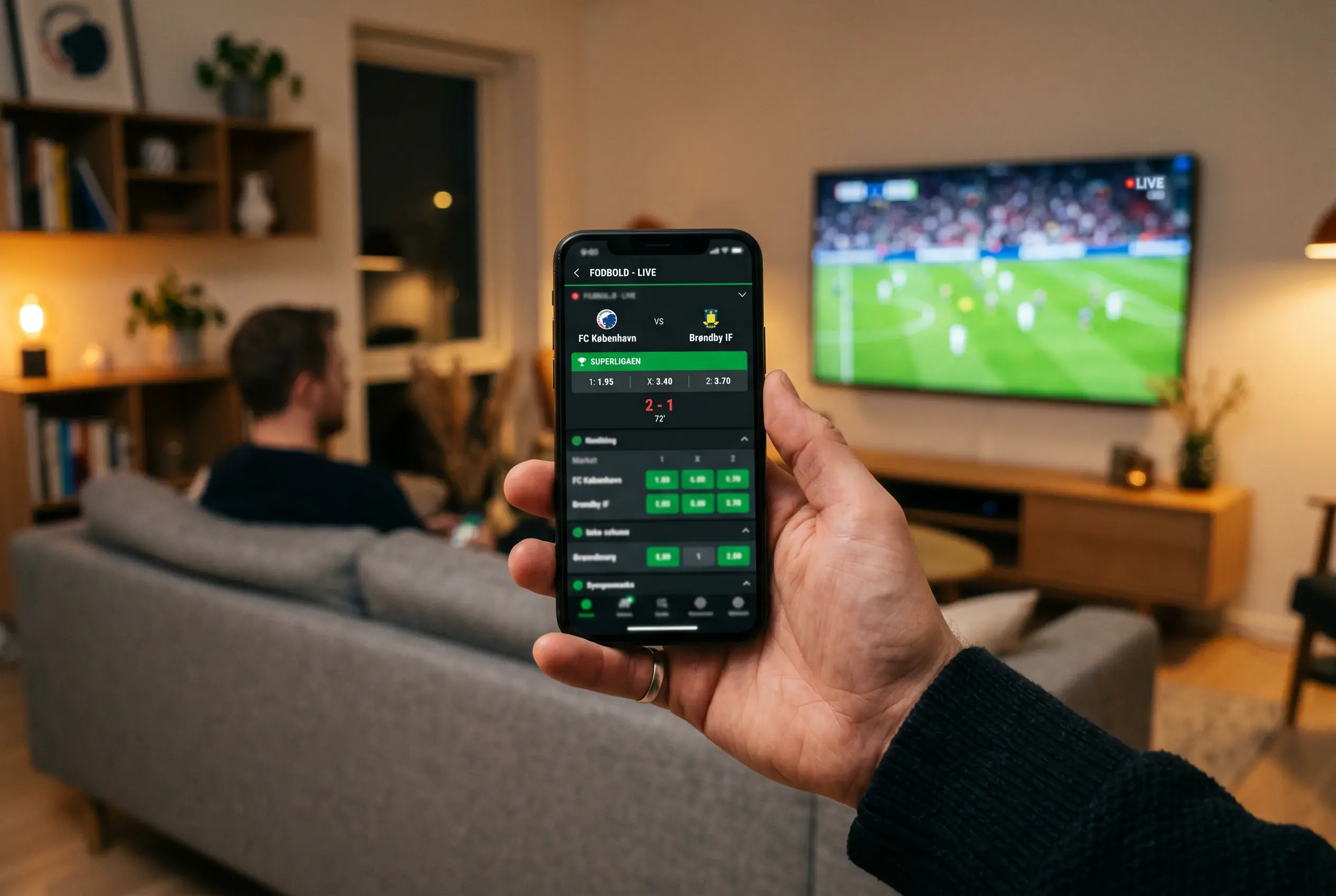 Mobil betting app på smartphone med live odds og dansk Superliga